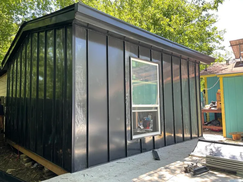 Black standing seam metal wall panels for Metal Roof Installation in Forks